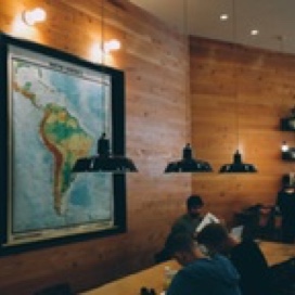 A group of people sitting around the table