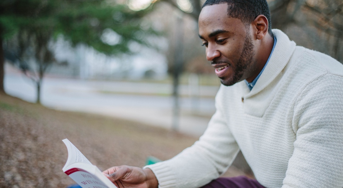 A men reading a book